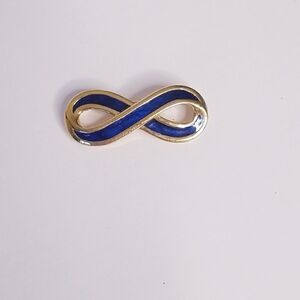 Vintage signed gold blue enamel eternity brooch